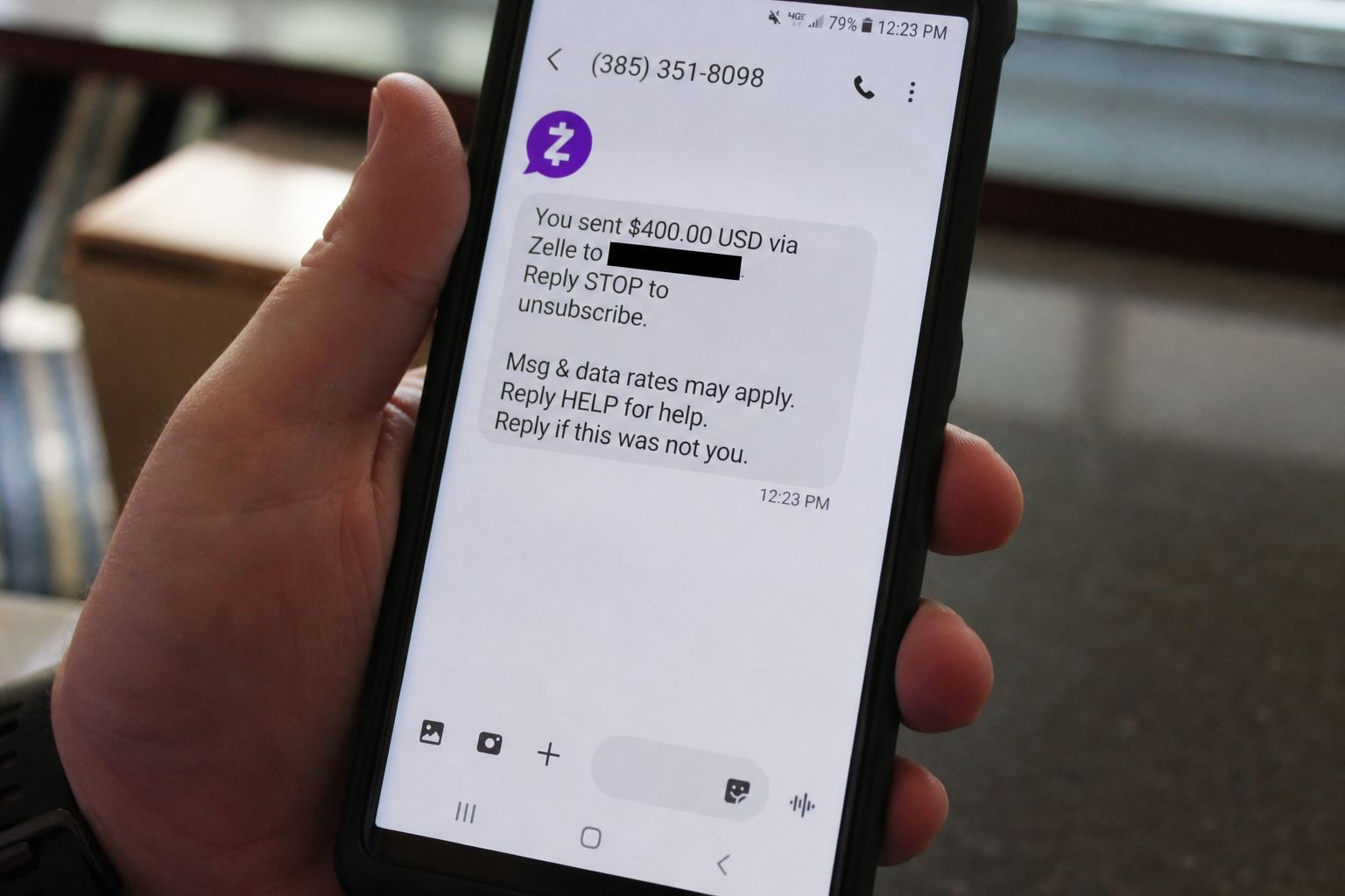 A phone showing a Zelle text about a payment you did not send.